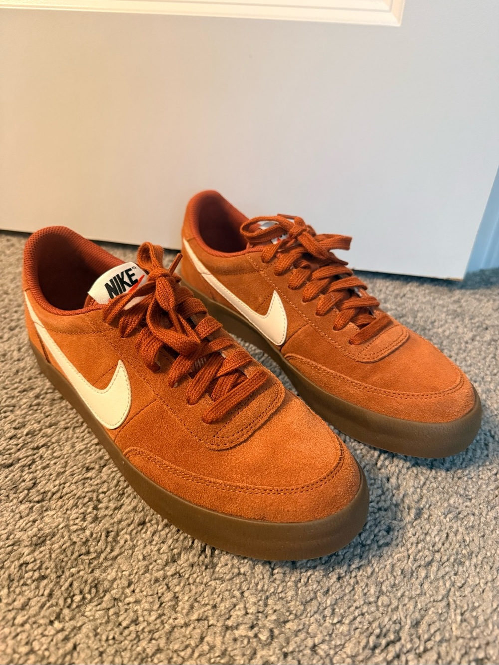 Nike Women's Orange Suede Low-Top Sneakers with White Swoosh